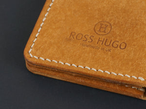 Tan hand stitched leather wallet