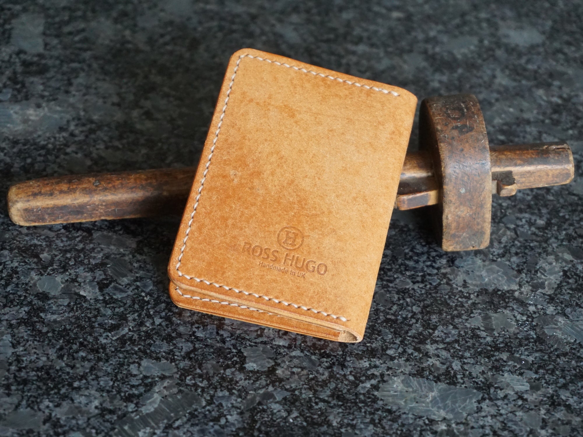 Back of leather handmade wallet tan